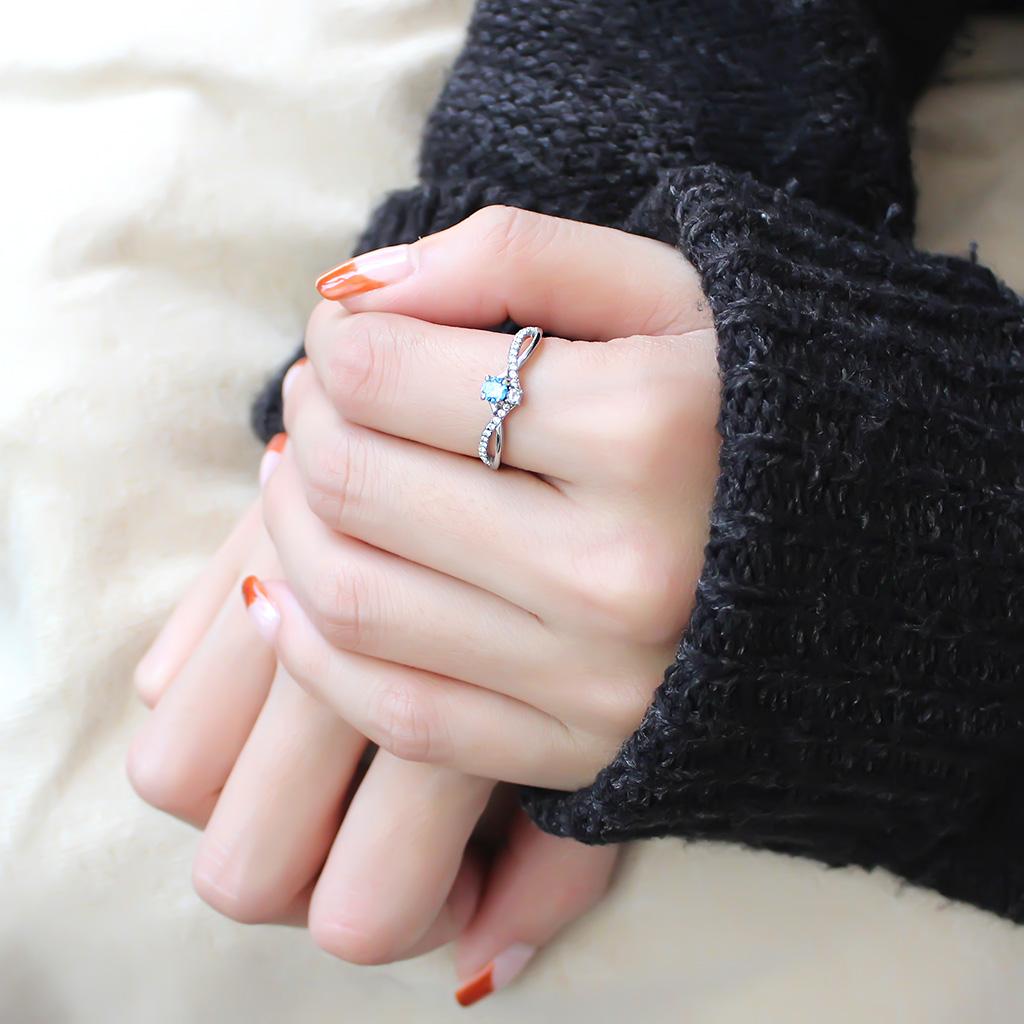 High polished (no plating) Stainless Steel Ring with AAA Grade CZ in Sea Blue