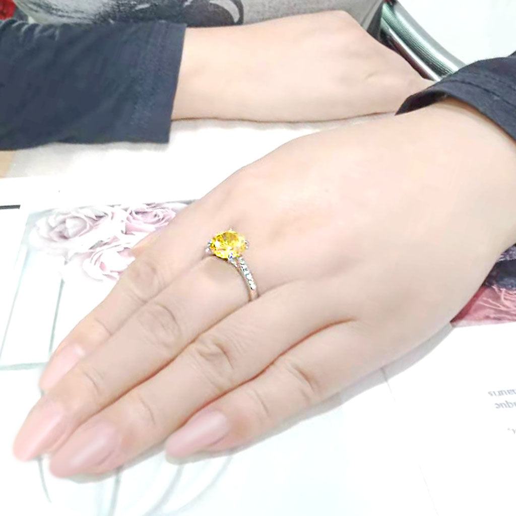 High polished (no plating) Stainless Steel Ring with AAA Grade CZ in Topaz