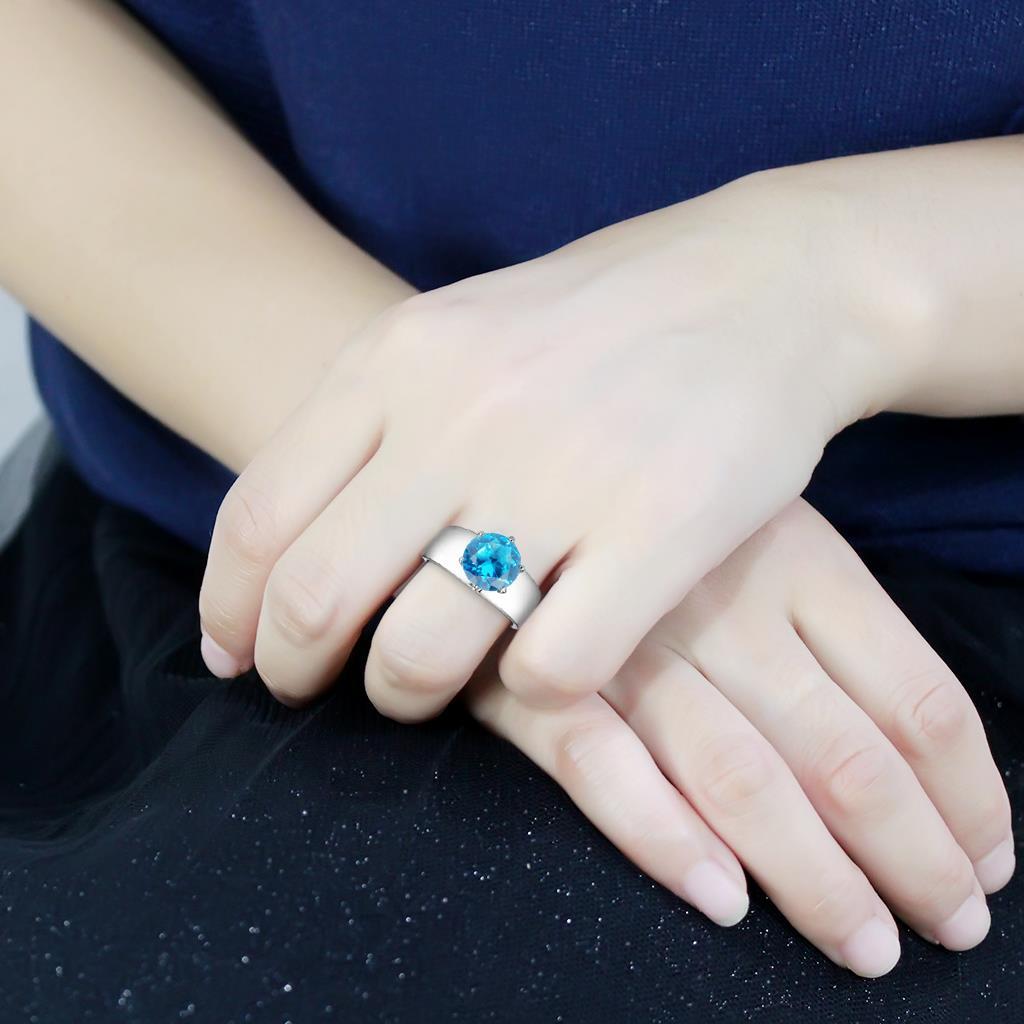 High polished (no plating) Stainless Steel Ring with Synthetic Synthetic Glass in Sea Blue