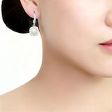 Rhodium Brass Earrings with Synthetic Pearl in White