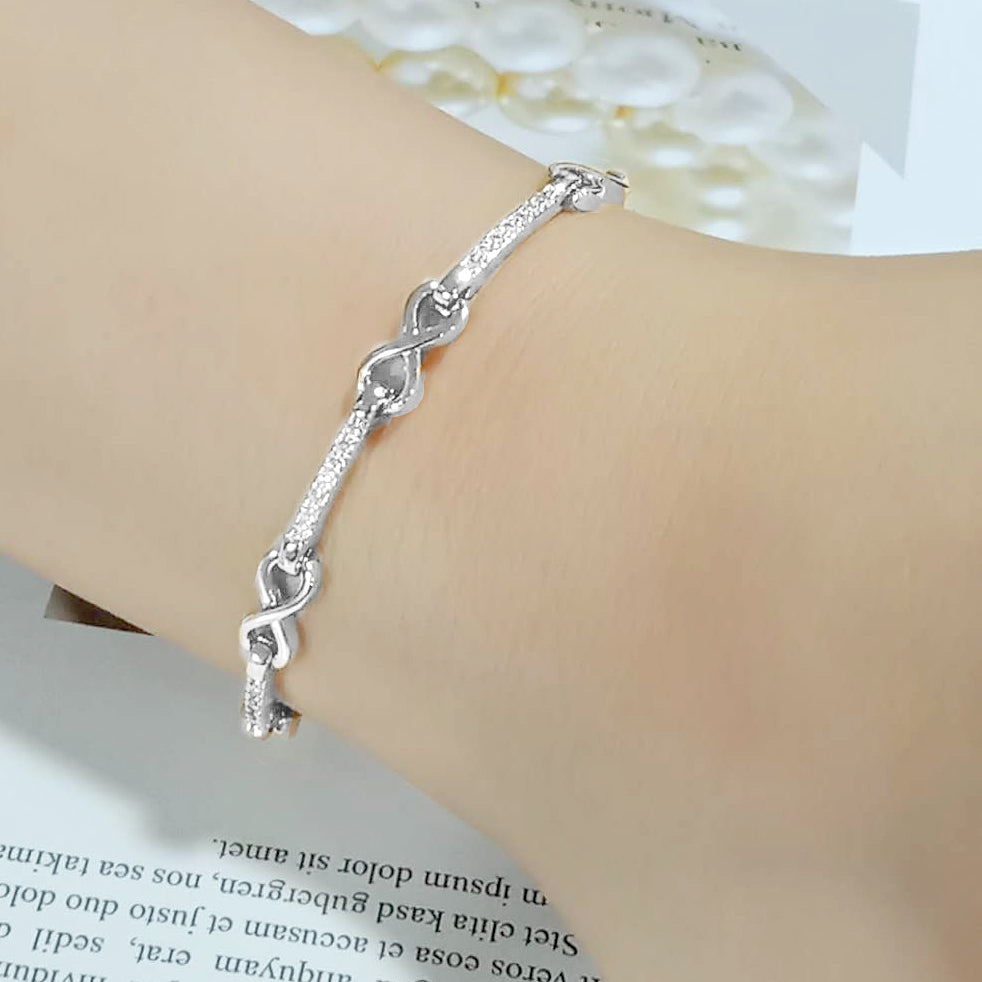 Rhodium Brass Bracelet with AAA Grade CZ in Clear