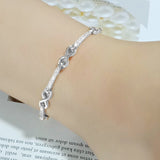 Rhodium Brass Bracelet with AAA Grade CZ in Clear