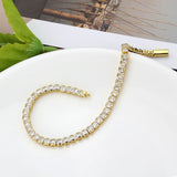 Gold Brass Bracelet with AAA Grade CZ in Clear