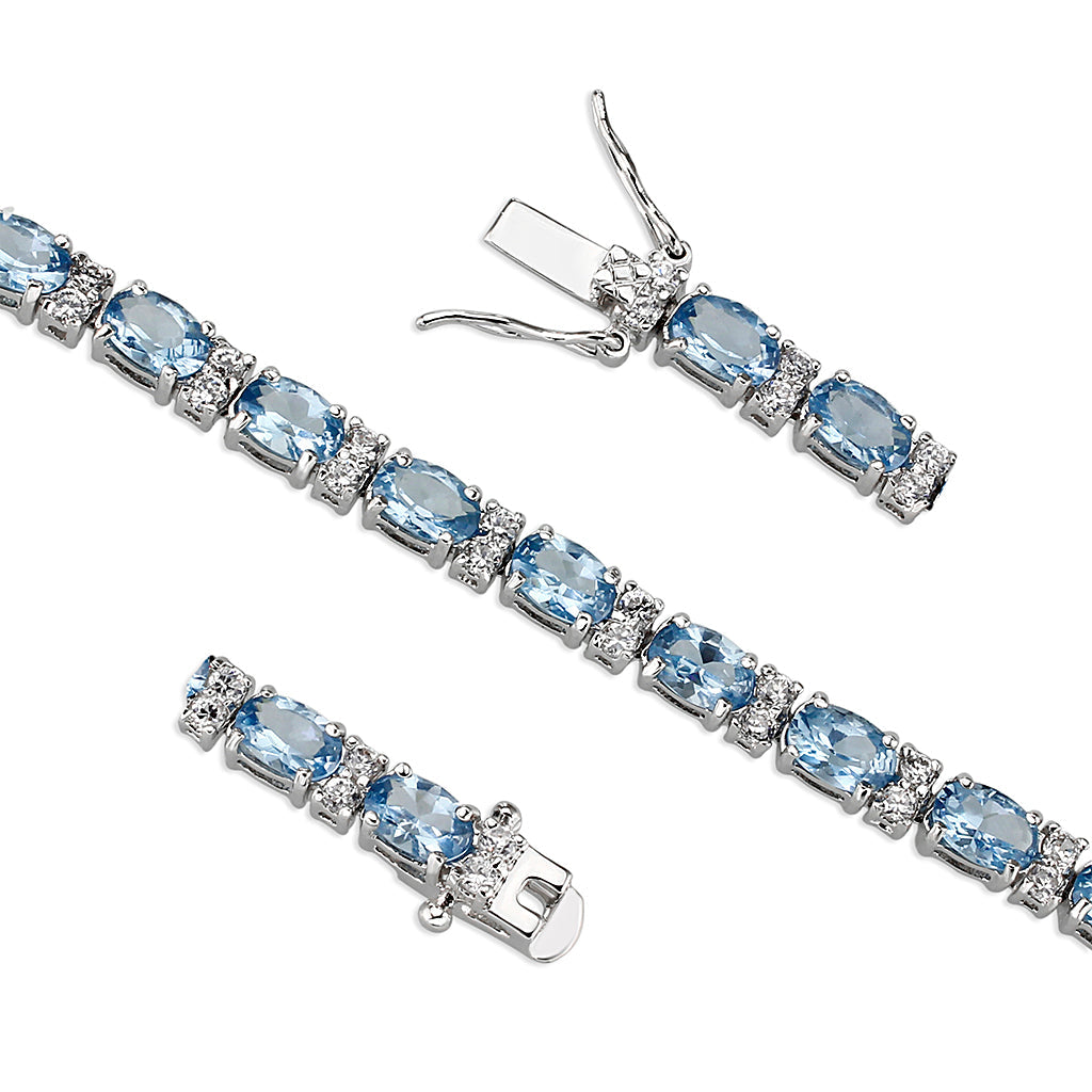 Brass  Bracelet with AAA Grade CZ  in Aquamarine Rhodium Plated-7"