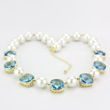 Gold Brass Necklace with Synthetic Synthetic Glass in Sea Blue